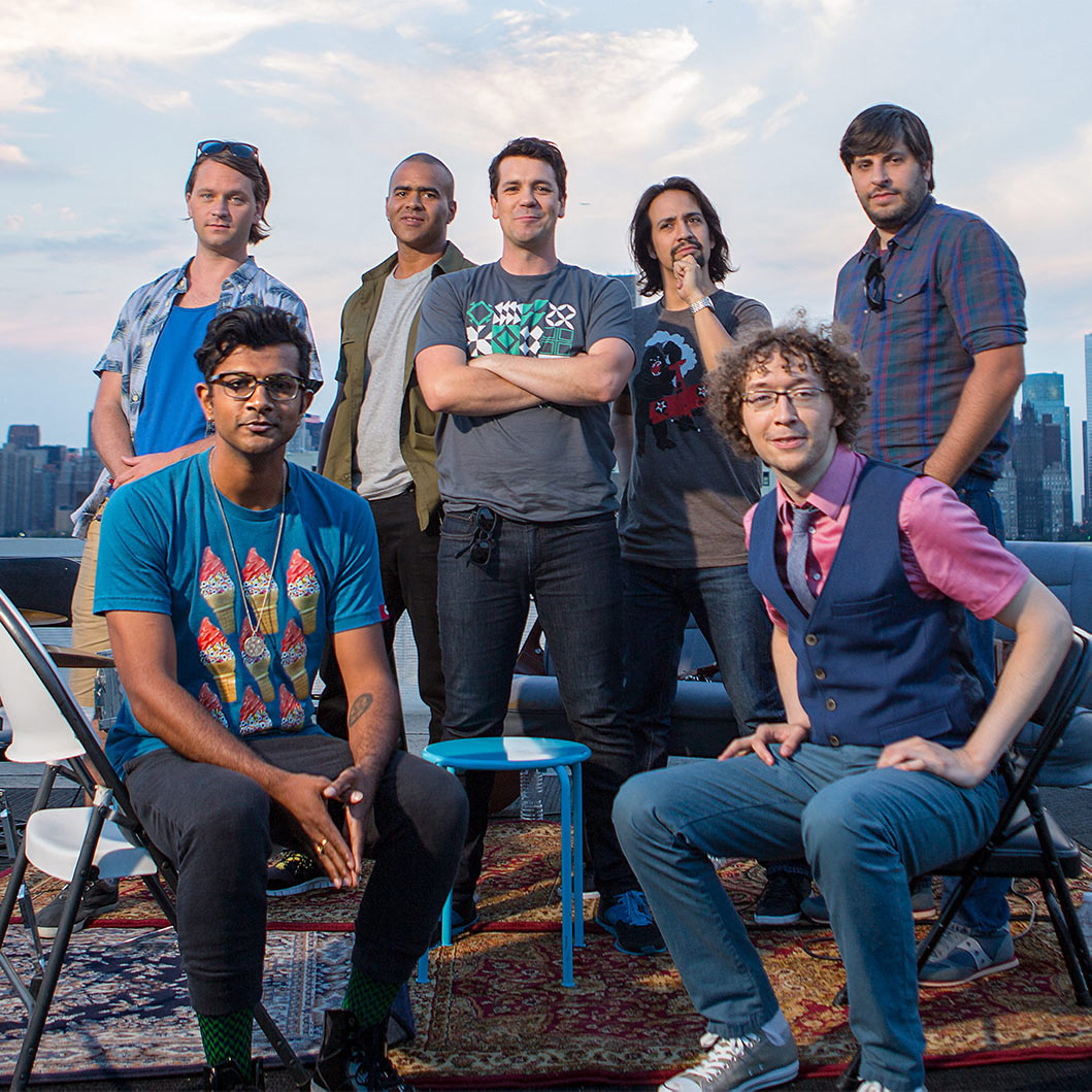 group of men posing for a photo