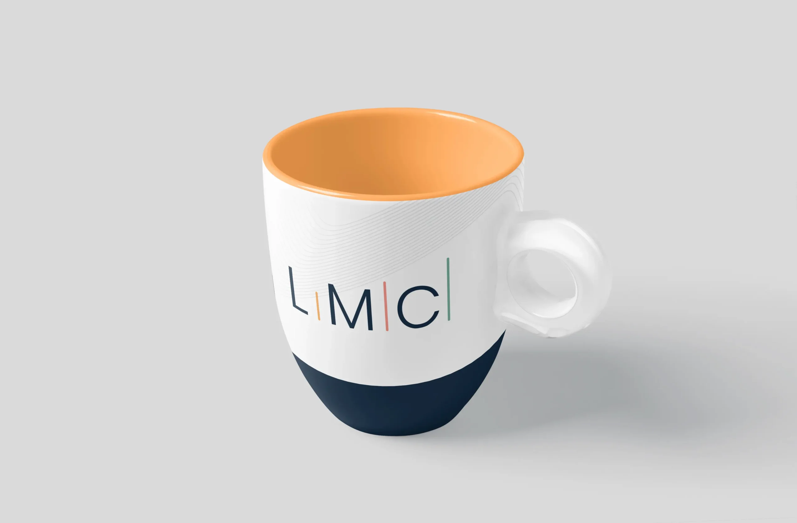 A white ceramic mug with an orange interior, a dark blue base, and the letters "LIMC" in a modern, multicolored font—perfect for showcasing your Small Business Branding Agency’s vibrant identity.