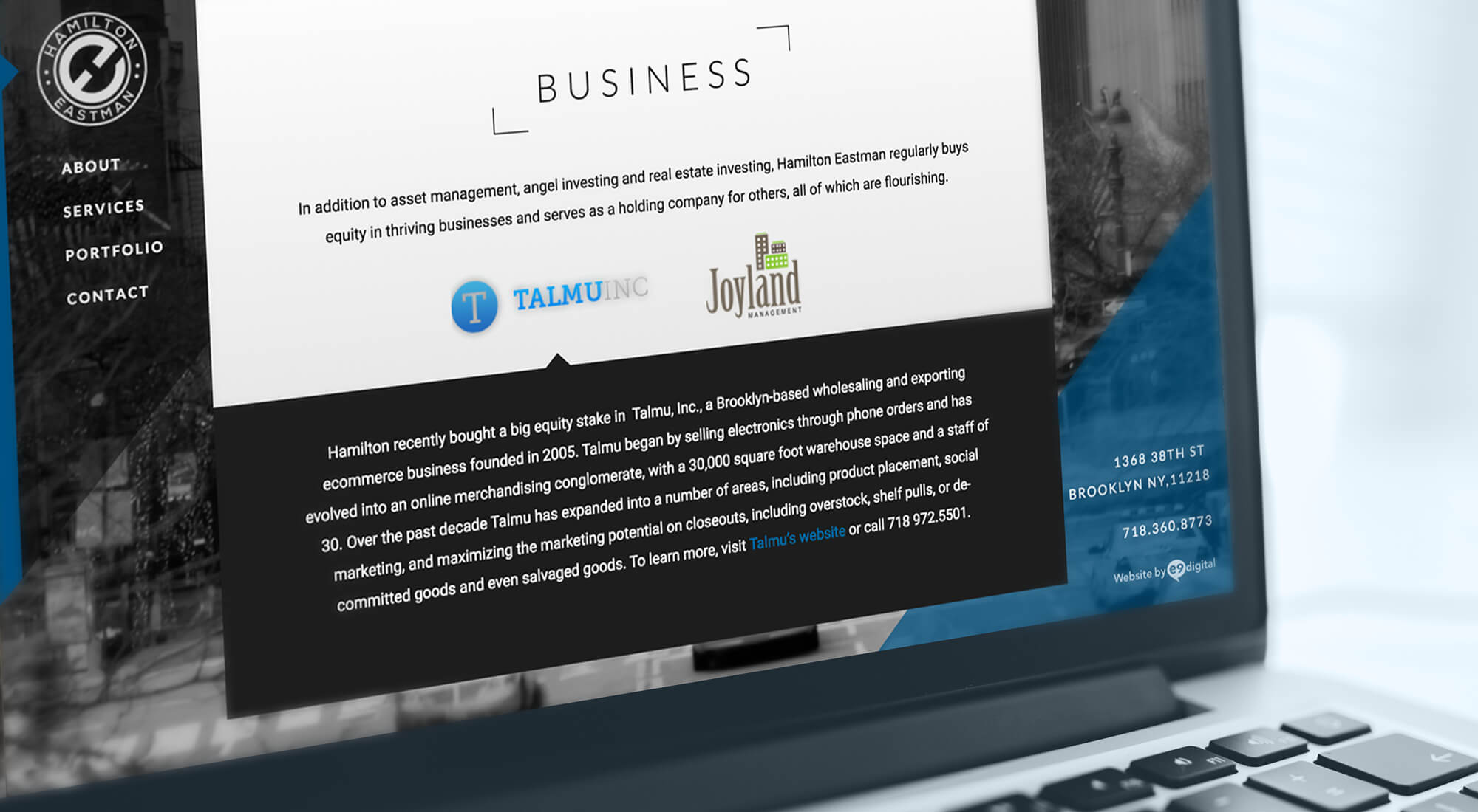 Laptop screen displaying a business website with company logos, text about investment holdings, and contact information on the right side.