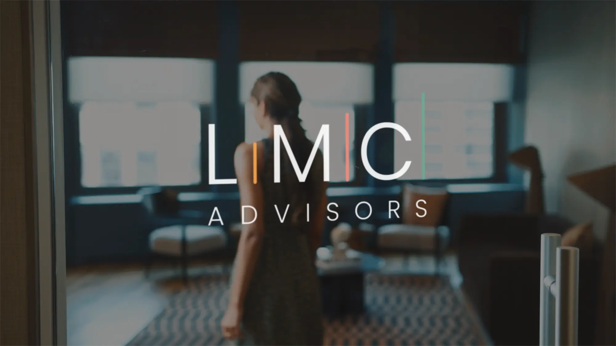 A woman stands in a modern, dimly lit office. The text "LMIC ADVISORS" is overlaid across the image, highlighting their expertise as a Small Business Branding Agency.