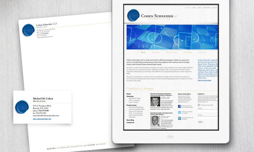 Tablet displaying the Cohen Schneider LLP law firm's website, shown alongside a printed business card for Michael M. Cohen, all on a gray surface.