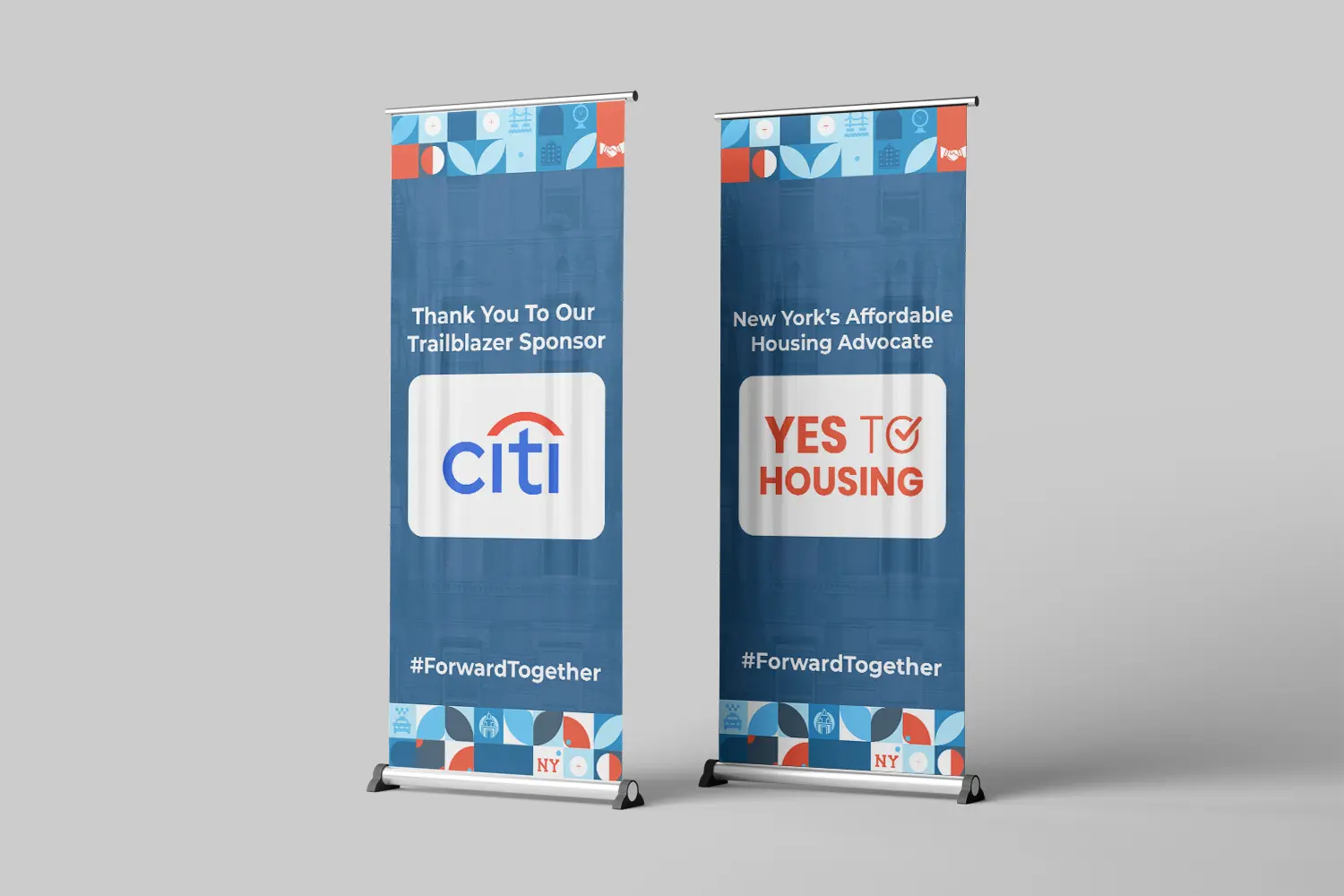 Two blue standing banners featuring sponsor Citi's logo and the message "YES TO HOUSING," designed by a Small Business Branding Agency, promote affordable housing with hashtag #ForwardTogether.