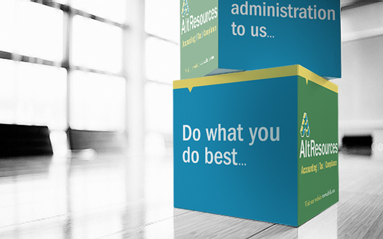 Two blue and green boxes with "Do what you do best..." and "administration to us..." text, placed on a reflective floor in a modern office setting.