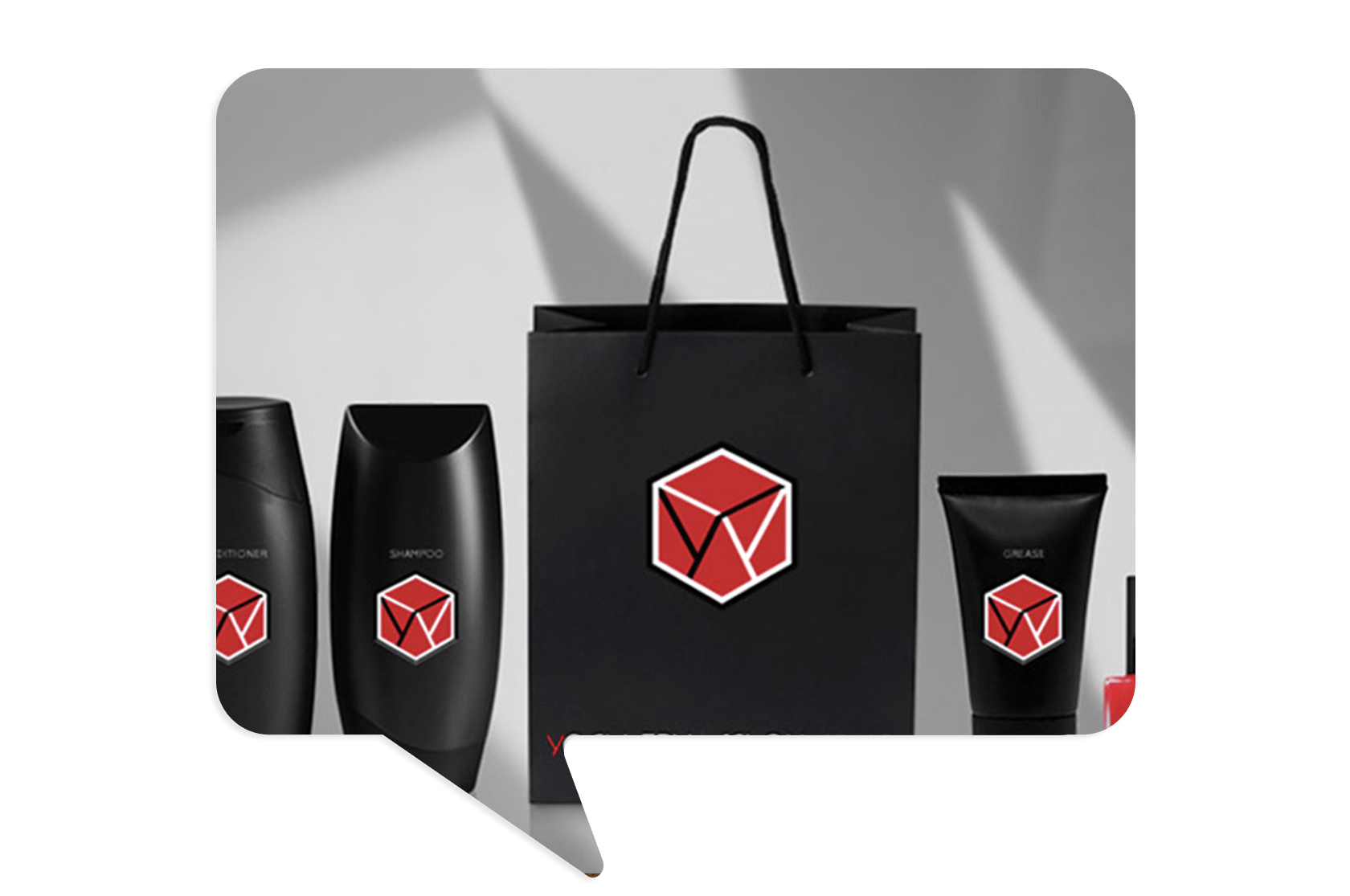 Black hair care product bottles and a black gift bag with a red geometric logo displayed against a light background.